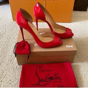 Cherry red patent leather peep toe pump